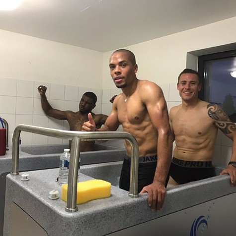 Three men using the Team CryoSpa ice baths at FC Dudelange, Luxembourg