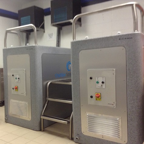 Team CryoSpa Sport ice baths with chillers wall mounted in background