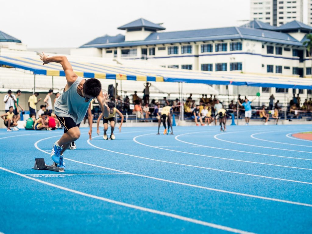 Sprinters starting 200m race